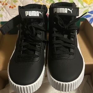 Puma Black and White Mid-Top Sneakers